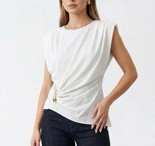 Top con detalle dorado